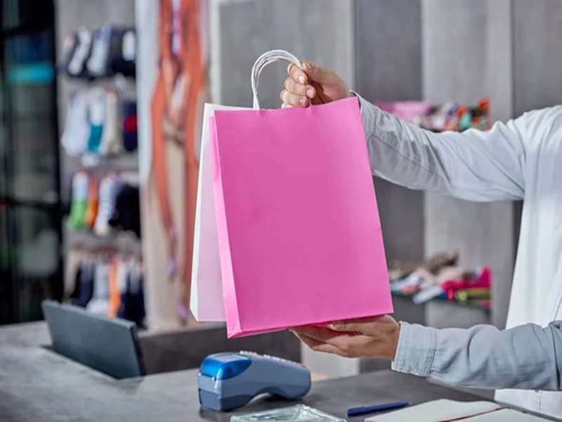 depositphotos_221697878-free-stock-photo-partial-view-young-salesman-holding